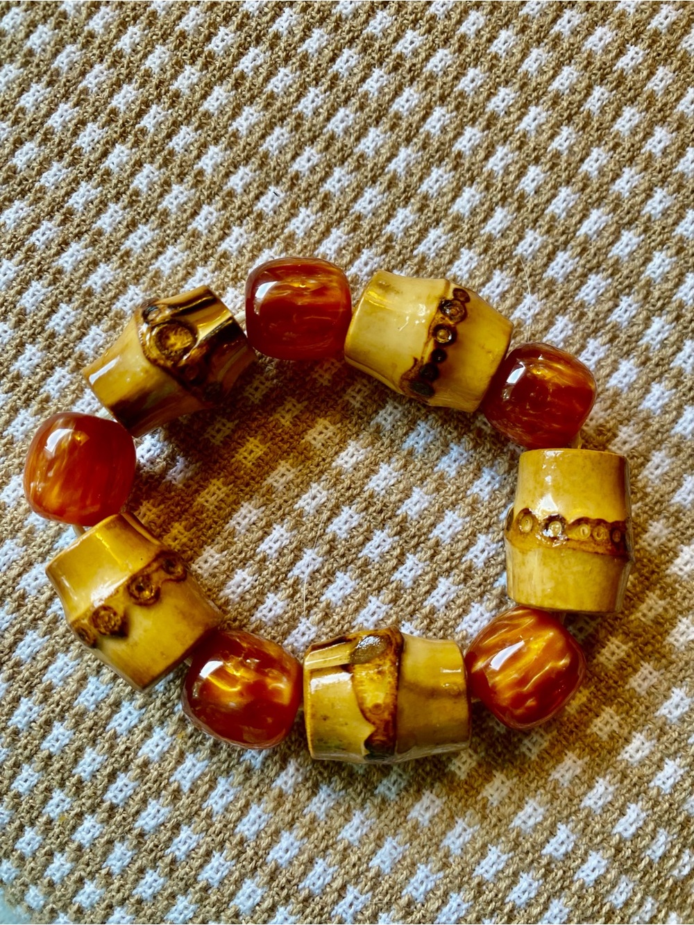 Amber colored beads and bamboo Stretch Bracelet fun transition piece approx 7”
